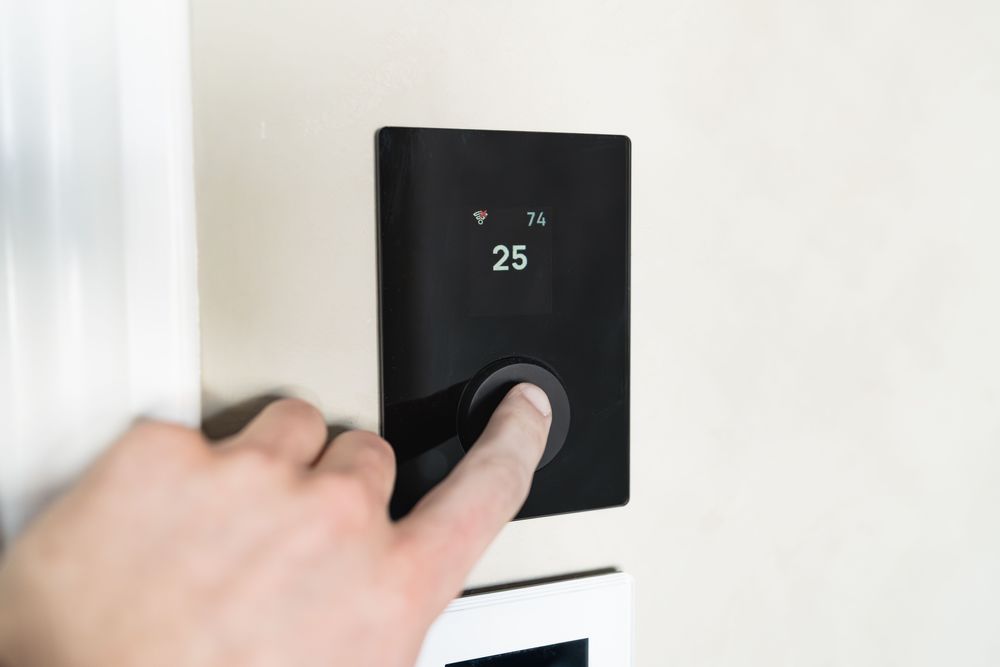 Thermostat mural d'un chauffage électrique